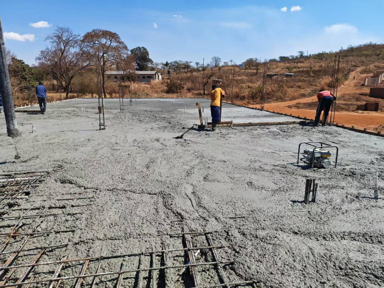 Concrete slab being placed and finished